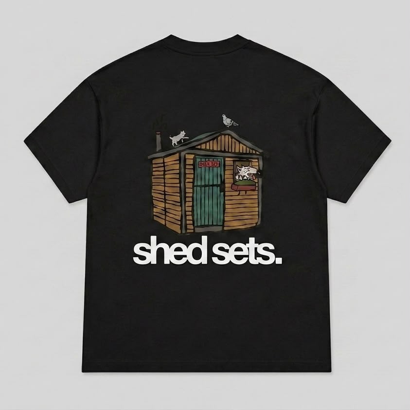 Shed Sets Graphic T-shirt (BLACK)